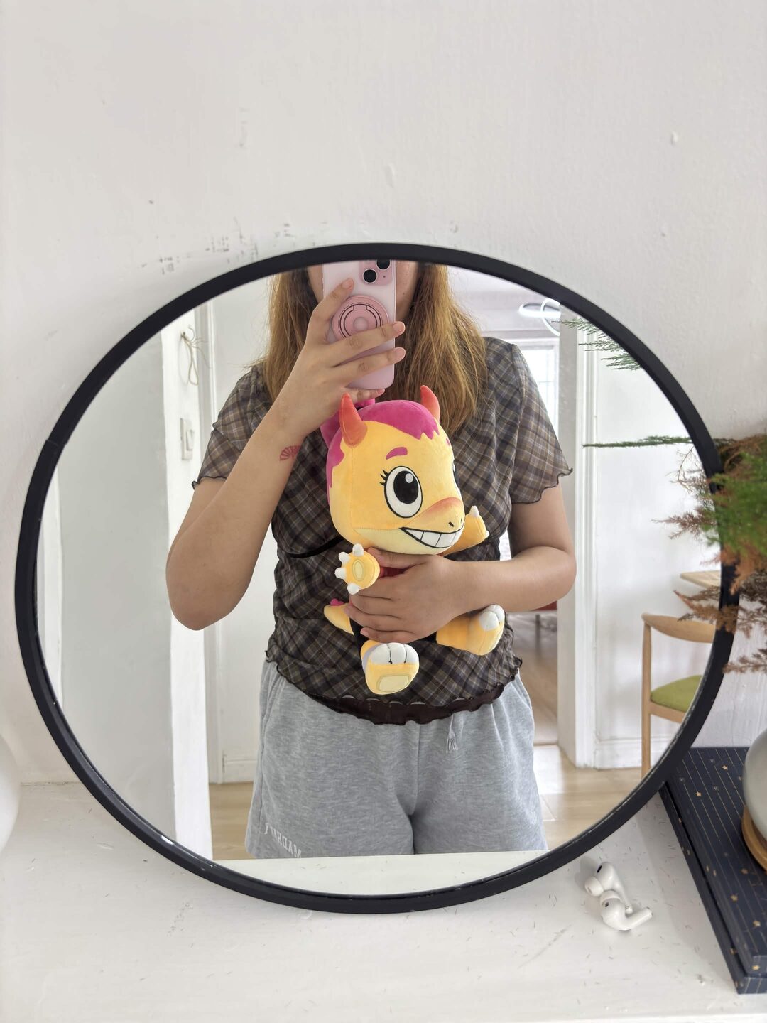 The Zappy plushie at home in a real room